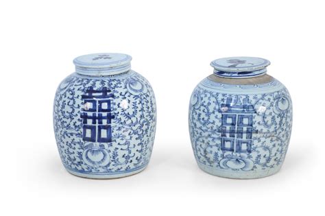 Pair Of Chinese Blue And White Floral Lidded Ginger Jar Vases