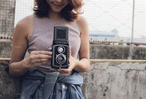 Woman Using Film Camera Containing Woman Teen And Female High