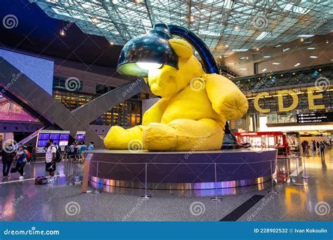 hamad airport quatar july 9 2021 giant yellow teddy bear installation in hamad