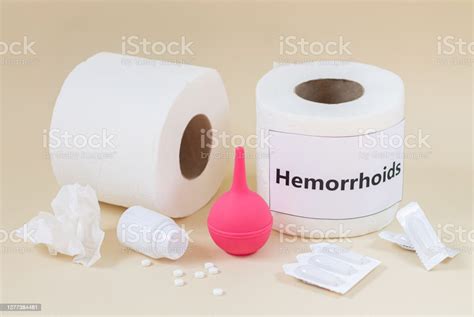 Hemorrhoids And Constipation Treatment Concept Toilet Paper Rolls