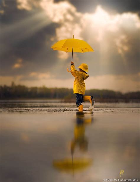 Yellow Umbrella Brings Sunshine Into The Rain Dancing In The Rain