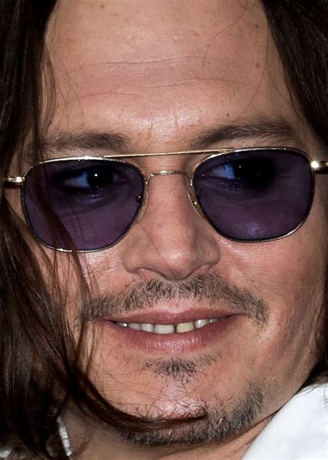 Johnny Depp Makes Special Cinemacon Appearance To Promote