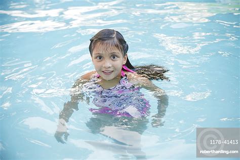 Smiling Hispanic Girl In Swimming Stock Photo