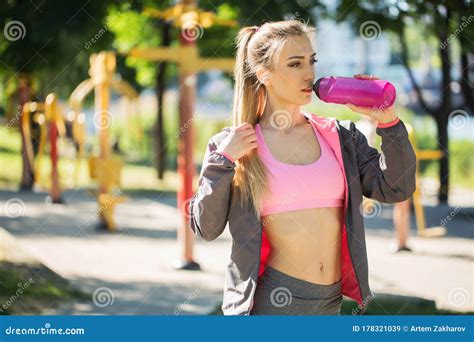 Young Blonde Girl Drinking Water During Morning Jogging Stock Image Image Of Drinking