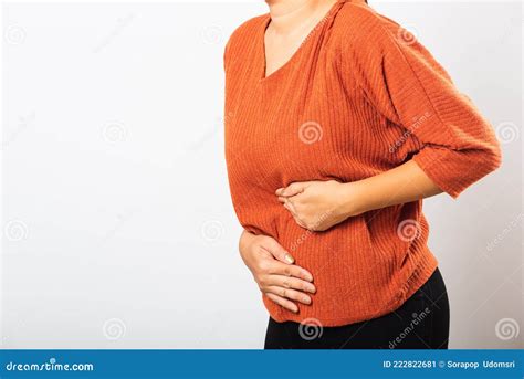 Woman Have Stomach Ache Holds Hands On Abdomen Part Of Body Stock