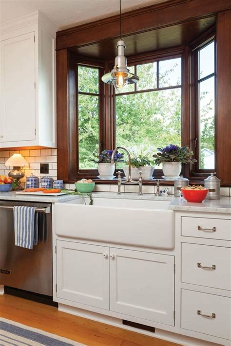It usually placed over the sink to create a bigger space when you do the dishes. Bay window over kitchen sink | Bungalow kitchen, Craftsman ...