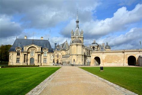 The Chateau De Chantilly Is A Historic Castle Located In Chantilly