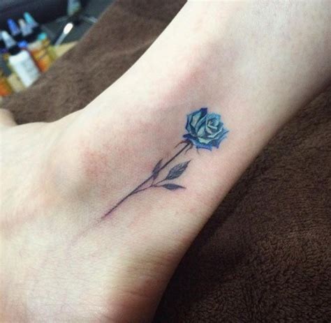 If you like the tiny tattoos, then take a look at this. 40+ Cute and Tiny Floral Tattoos for Women | Blue rose ...