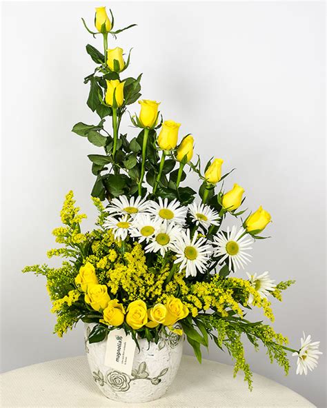 Yellow Roses Soligado And White Flowers Arrangement
