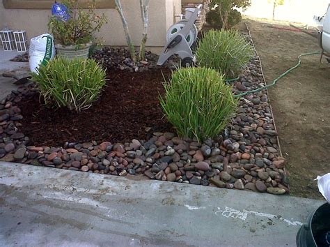 River Rock And Mulch Front Yard Mulch Landscaping Landscaping With