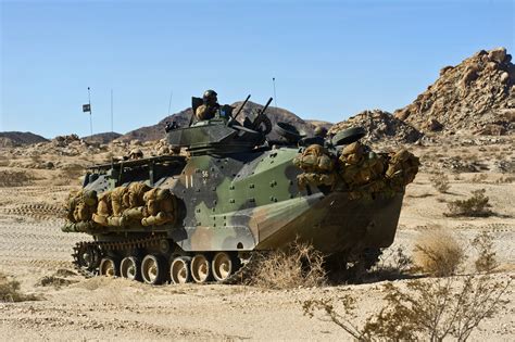 Marines Maneuver Towards Their Objective In An Armored Amphibious