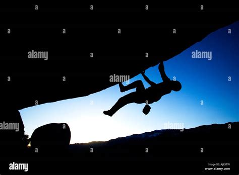 Man Bouldering On An Overhang Stock Photo Alamy