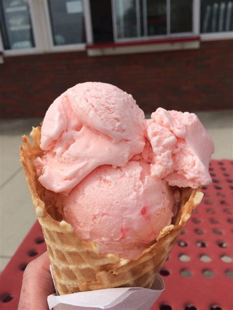 Delicious Cherry Ice Cream On A Crispy Waffle Cone