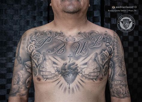 A Man With Tattoos On His Chest Has The Words Love And Hearts Tattooed On His Chest