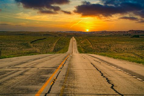 Road Less Traveled Long Road Into The Sunset Near Cody Wyo Mr