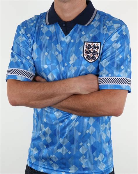 Buy the latest england home, away and training football kit from nike. 80s Casual Classics England 1990 Retro Football Shirt Blue ...