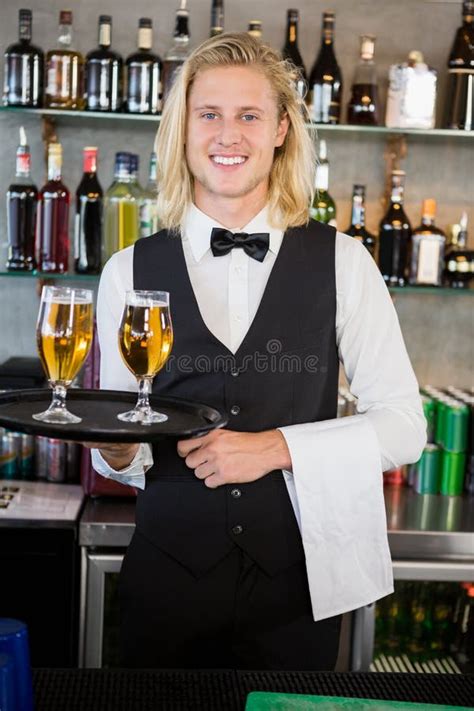 Portrait Of Waiter Holding Tray With Glasses Of Red Wine Stock Image Image Of Happy Server