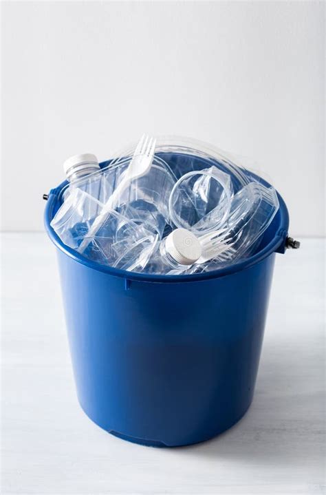 Clean Recyclable Plastic Bottles Containers Cups In Garbage Bin