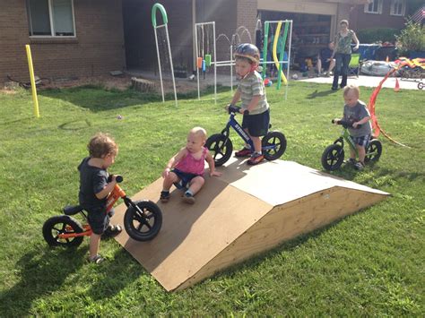 Drilled a hole for now, by pulling the one bolt it becomes a ramp, i push the bike up and the further up it goes the easier it is to push. preschool bike ramps - Google Search | Kids outdoor play ...