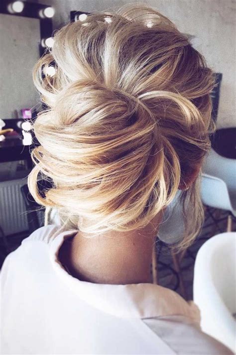 Half up bun is not only nice looking. Modern day chignon-style low messy bun updo-- beautiful ...