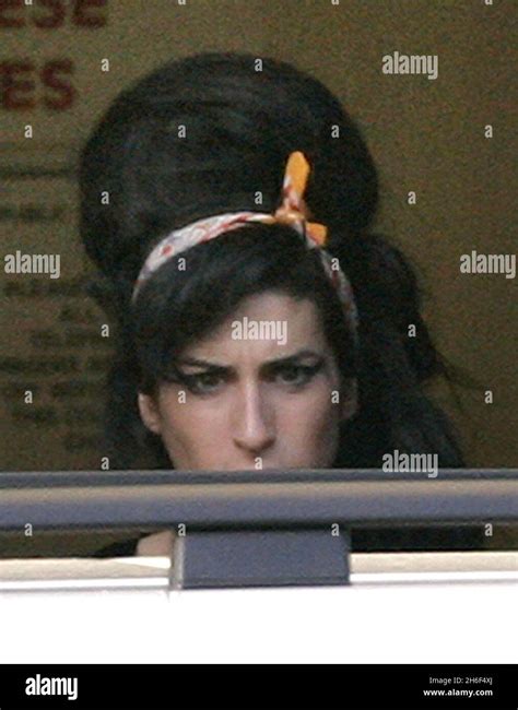 Amy Winehouse Is Pictured Leaving Snaresbrook Crown Court In London This Afternoon After Her
