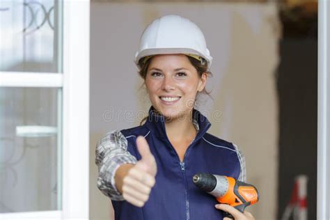 Female Construction Worker With Thumbs Up Stock Image Image Of Renewal Handyman 218793489