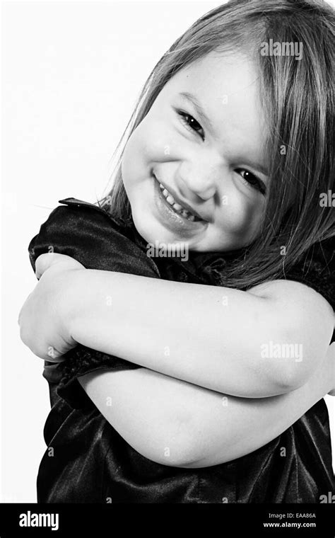 Beautiful Little Girl Posing For Camera In Studio Stock Photo Alamy