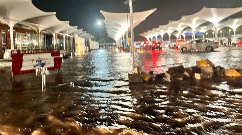 Ahmedabad Airport Flooded Passengers Wade Through Knee Deep Water