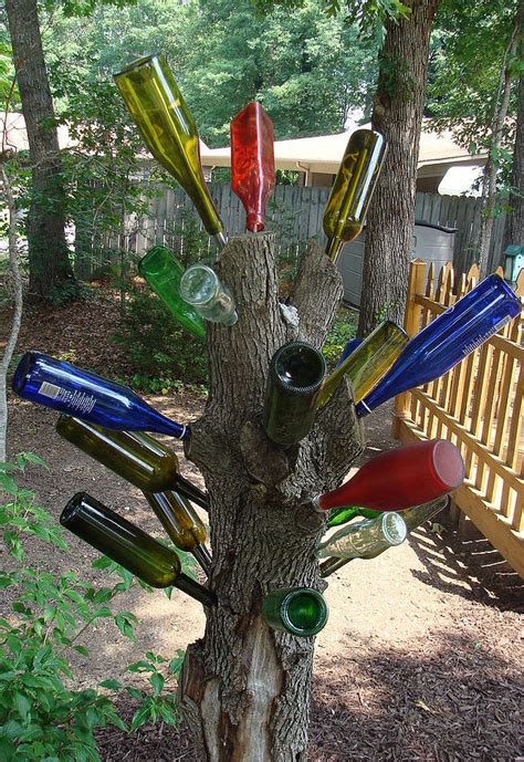 50 diy wine bottle craft upcycling ideas. 20+ Ideas of How to Enhance Your Garden with Glass Bottles
