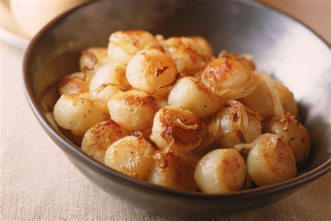Sweet Tender Bay Scallops Sauteed With Garlic And Served With Parsley