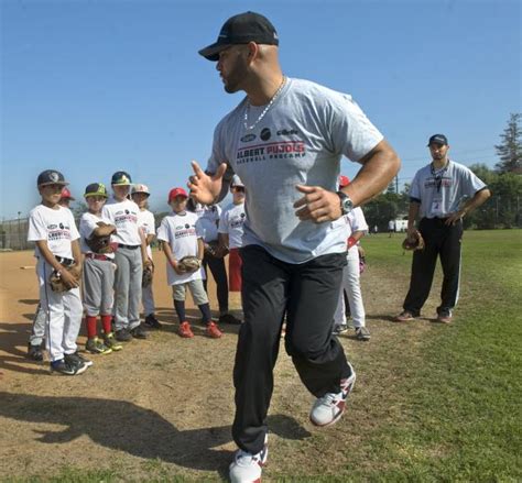 Smith Oc Kids Help Angels Albert Pujols Stay Grounded