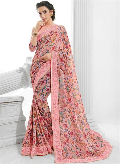 light pink floral georgette saree features a dhupioni silk georgette blouse alongside a floral