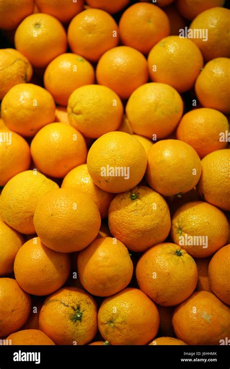 Foodalimentverticalcitrusyellowdisplay Of Orangesround Fruit
