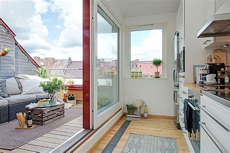 Chic Swedish Loft Promises Lovely Terrace Views Decoist
