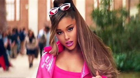 Ariana Grande Poses In Sexy Pink Lingerie In Sneak Peek Of ‘7 Rings