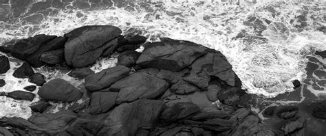 Download Wallpaper 2560x1080 Coast Stones Sea Waves Black And White