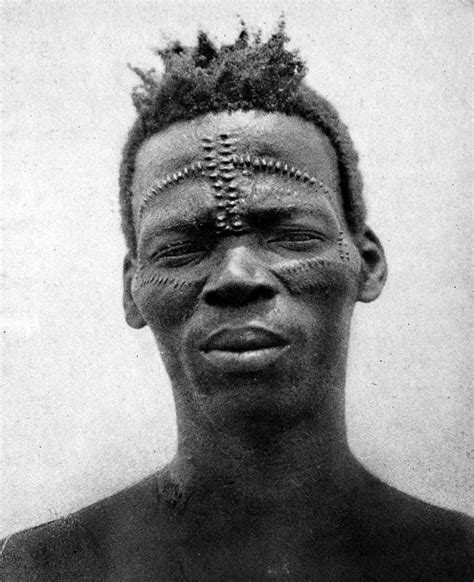 Africa Portrait Of A Man From The Congo With Scars On His Face