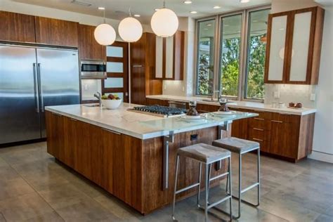 Check Out The Attractive Wooden Cabinets And Sleek Spacious Island In