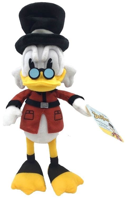 The Donald Duck Plush Toy Is Wearing A Top Hat