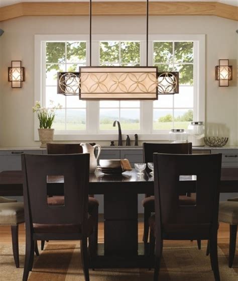 Dramatic pendant lighting hung over the dining table is an interior look that is both stylish and functional. Arts & Craft Design Box Wide Ceiling Light