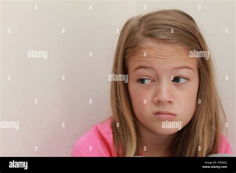 Girl With Bored Facial Expression Stock Photo Alamy