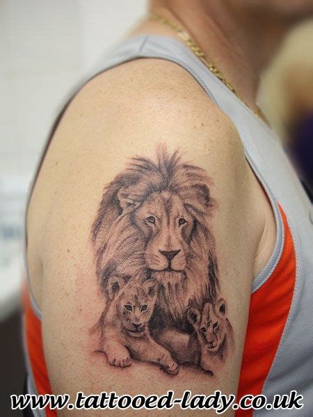 Black And Grey Lion With Two Cubs Tattoo On Right Shoulder Lioness