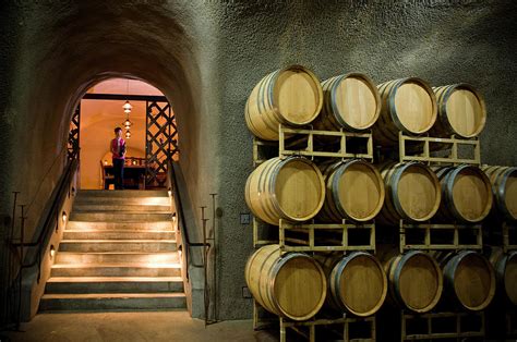 Oak Barrels In Wine Cave At Winery Napa Photograph By Seanfboggs Pixels