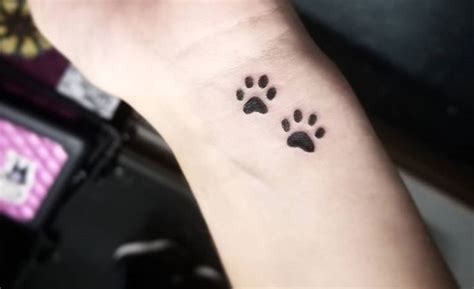 See more ideas about tattoos for women, print tattoos, pawprint tattoo. 25 Best Dog Paw Print Tattoos on Wrist | The Paws