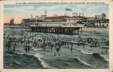 In The Surf Showing Murdochs Bath House Seawall And Boulevard Galveston Tx Postcard