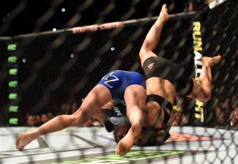 Ufc Results Ronda Rousey Defeats Cat Zingano In Seconds Ronda