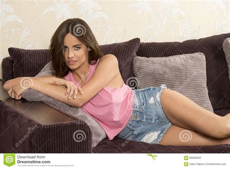 Charming Brunette Girl On Couch Stock Photo Image
