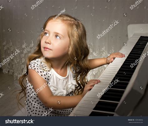 Little Girl Playing Piano White Room Stock Photo 109548056 Shutterstock