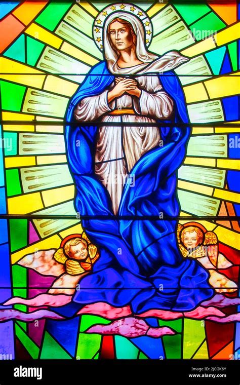 Virgin Mary Stained Glass Window With Christian Religious Symbols Seen