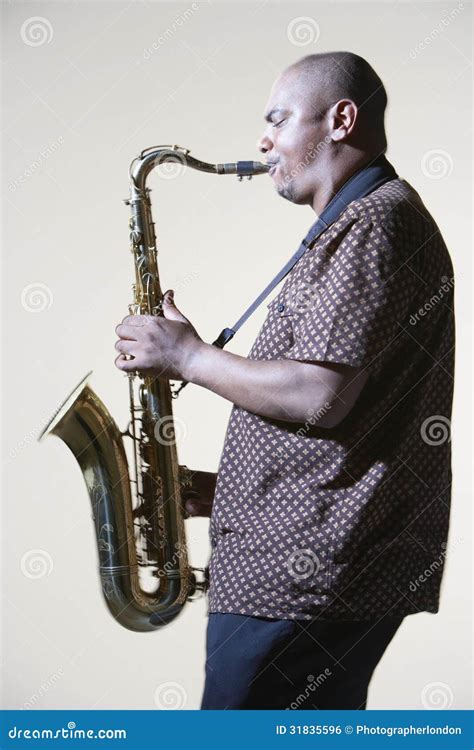 Side View Of Man Playing Saxophone Stock Photo Image Of Instrument
